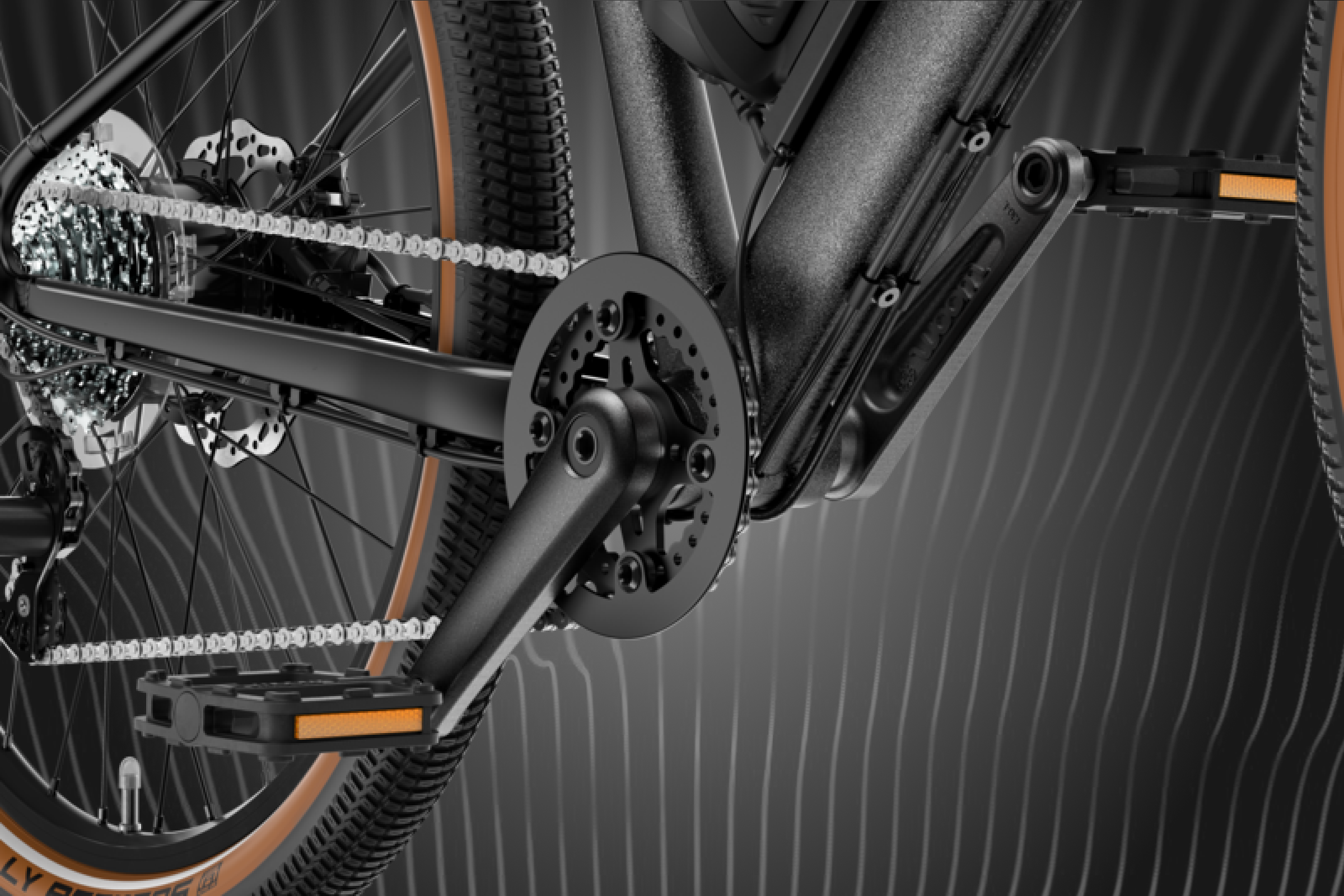 Detailansicht der Kurbel, der Pedale und des Hinterrads am woom EXPLORE e E-Bike.